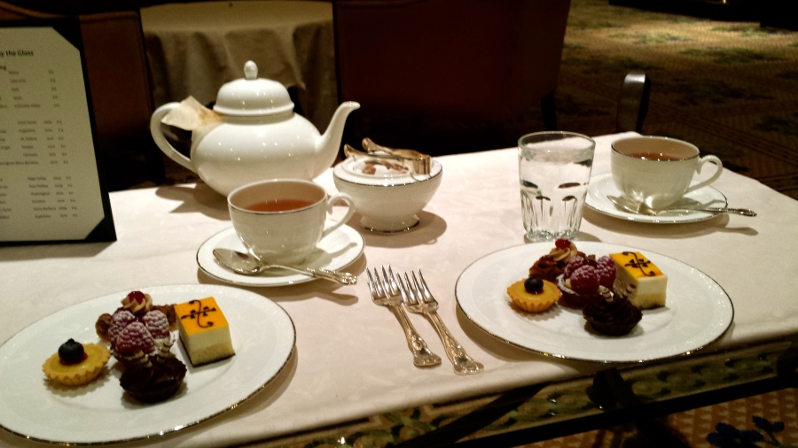 Last course: Chocolates, fruit tarts and mini pecan pie bars with caramel pear tea and vanilla bean tea.